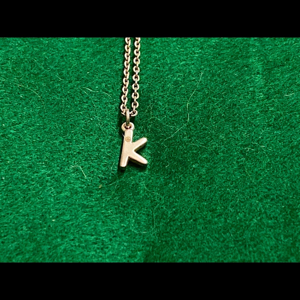 Initial “K” necklace by Kenneth Cole